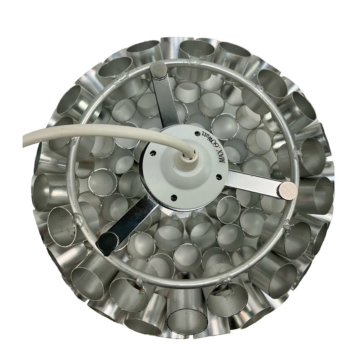 Metallic cylindrical component with multiple small chambers on a white background