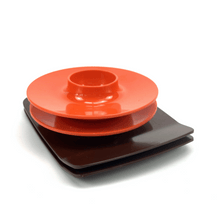 Lade das Bild in den Galerie-Viewer, Set of orange and brown melamine plates on a white background