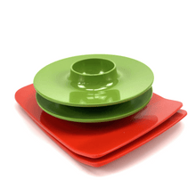 Load image into Gallery viewer, Stack of green egg cups and red plates on a white background