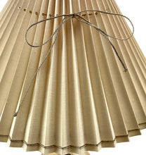 Load image into Gallery viewer, Beige pleated fabric with a string on a white background