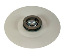 Load image into Gallery viewer, Round metallic object with a central glass component on a white background