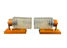 Load image into Gallery viewer, Pair of table lamps with glass cylindrical shades and wooden bases on a white background