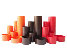 Load image into Gallery viewer, Collection of cylindrical objects in orange, brown, and red on a white background