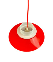Load image into Gallery viewer, Red and white lampshade with a visible light bulb on a white background