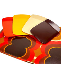 Lade das Bild in den Galerie-Viewer, Set of four colorful Rosti buttering boards on a matching tray with a pattern.