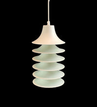 Load image into Gallery viewer, Pendant light with stacked circular design on a black background