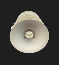 Load image into Gallery viewer, White cylindrical light fixture on a black background
