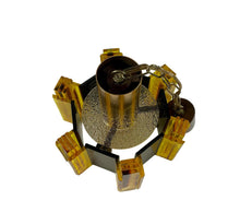 Load image into Gallery viewer, Decorative light fixture with gold and amber colors on a white background