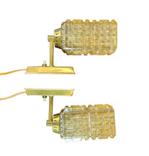 Lade das Bild in den Galerie-Viewer, Two gold track lights with crystal-like glass shades on a white background