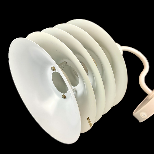 This rare vintage Danish lamp is a statement piece for collectors and interior enthusiasts, blending minimalist aesthetics with functional elegance.