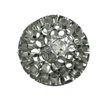 Load image into Gallery viewer, Decorative metal wall art with circular design and central crystal on a white background
