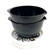 Load image into Gallery viewer, Two black melamine bowls stacked on a white coaster and white background
