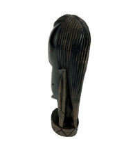 Lade das Bild in den Galerie-Viewer, Black wooden statue with intricate carvings on a white background
