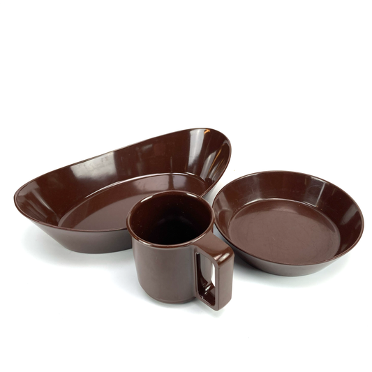 Set of brown melamine dishes including a bowl, a cup, and a platter on a white background