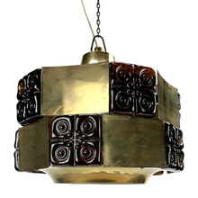 Load image into Gallery viewer, A beautiful retro Claus Bolby pendant light featuring a patinated brass body and a smoked glass insert. The lamp is fully intact and in excellent vintage condition.
