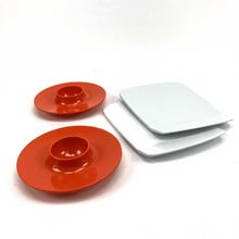 Load image into Gallery viewer, Two red rosti melamine plates and two white melamine square plates on a white background
