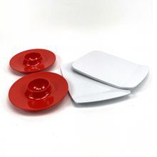 Load image into Gallery viewer, Two red egg cups and two white buttering boards on a white background
