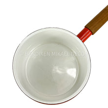Load image into Gallery viewer, White enamel frying pan with a red handle on a white background, featuring Bendixen Mikael Decor branding.
