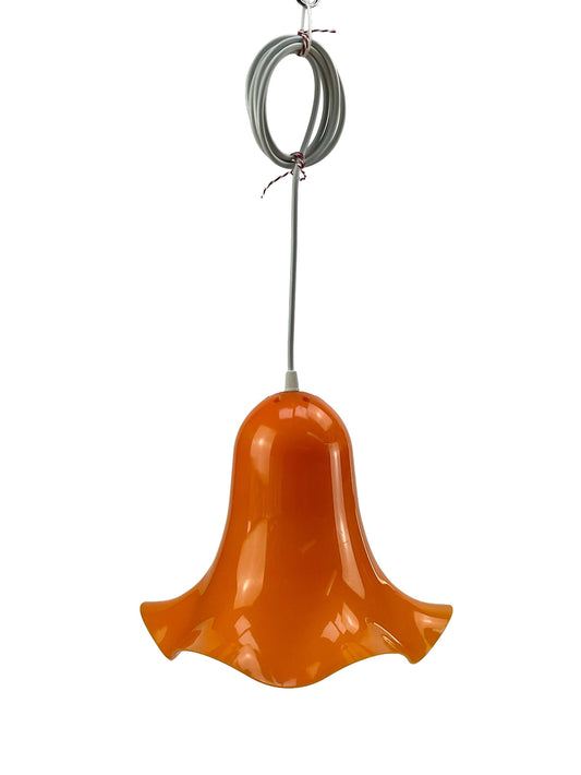Flower-shaped lamp pendant from the 70s, orange plastic, rim with a wave look.