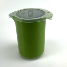 Load image into Gallery viewer, Green container with a lid on a white background
