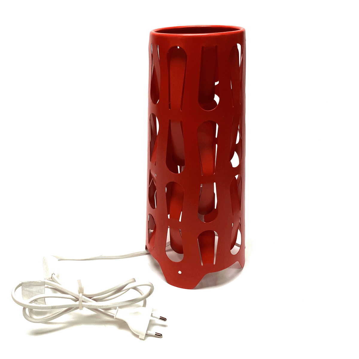 Red cylindrical lamp with a textured design on a white background