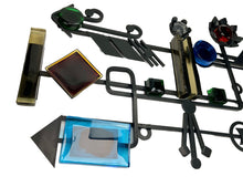 Load image into Gallery viewer, Decorative metal wall art with various shapes and colors on a white background. Svend Aage Holm Sørensen Brutalist Cast Iron Wall Sculpture with Coloured Glass, Dantoft Denmark 1960s
