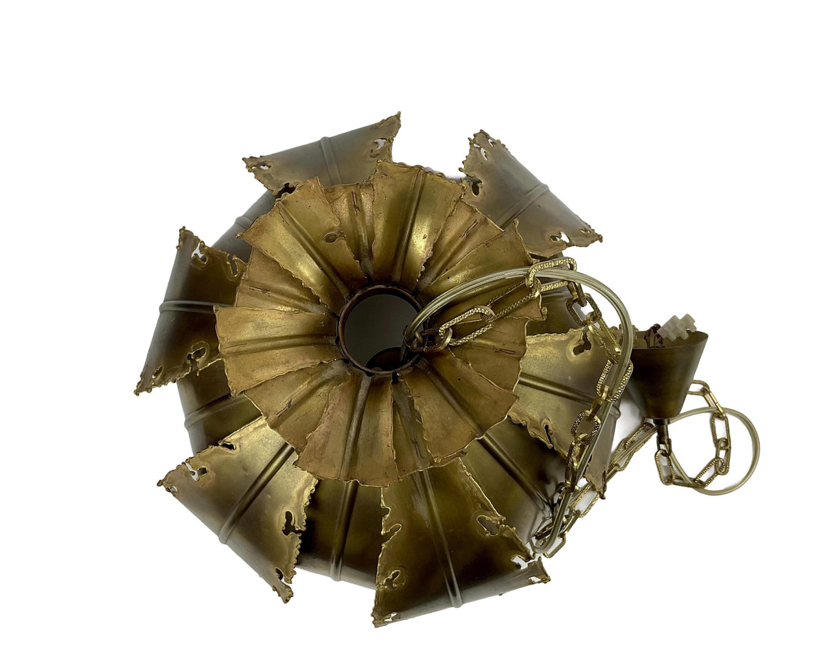 Bronze metal decorative object on a white background