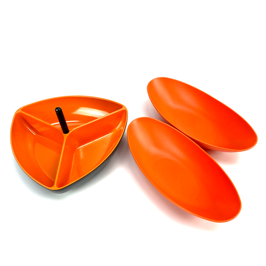 Orange plastic trays on a white background