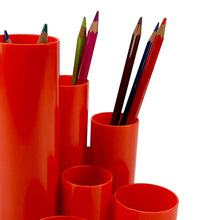 Load image into Gallery viewer, Red cylindrical holders with colored pencils on a white background
