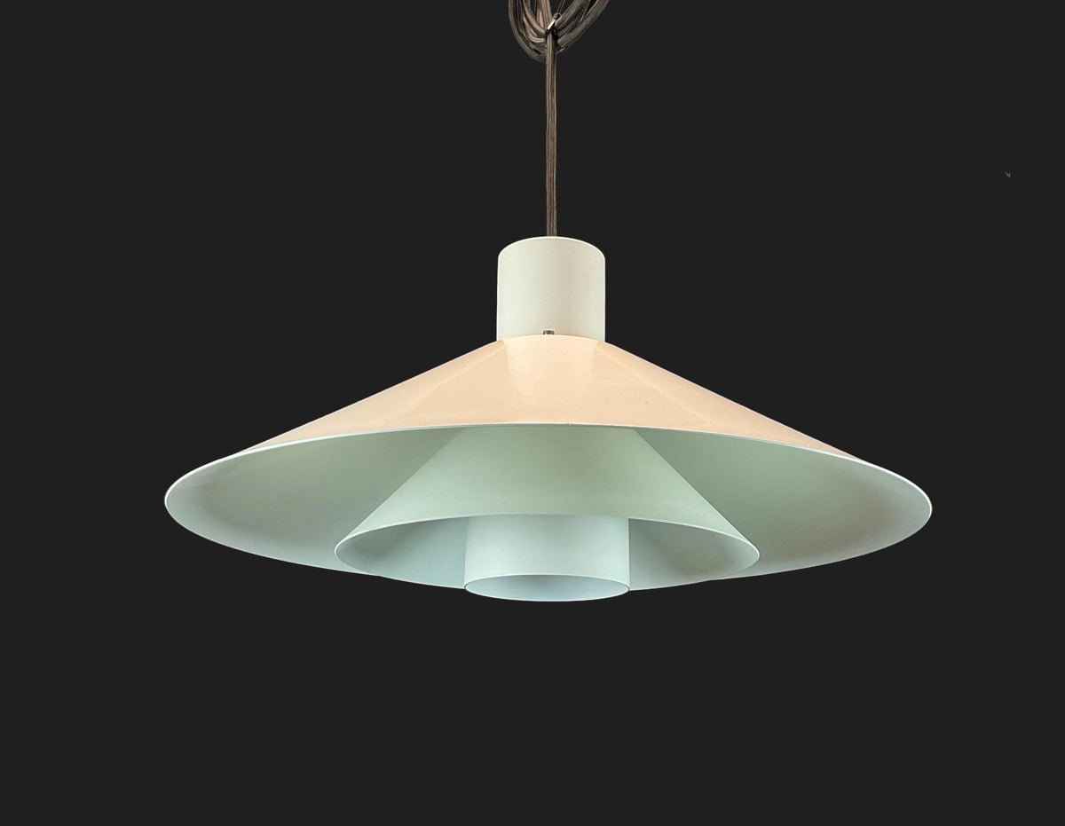 Pendant light with a white shade on a black background