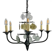 Load image into Gallery viewer, Svend Aage Holm Sørensen Viking 6-Arm Cast Iron Chandelier, Amber Glass, 1960s. Decorative chandelier with candle-style lights and hanging coins on a white background
