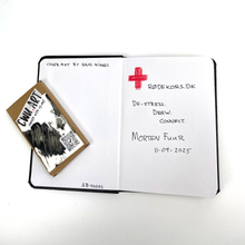 Load image into Gallery viewer, Open notebook with handwritten text and a card on a white background. The Circulated Canvas: A Create-With-Us Chain Sketchbook
