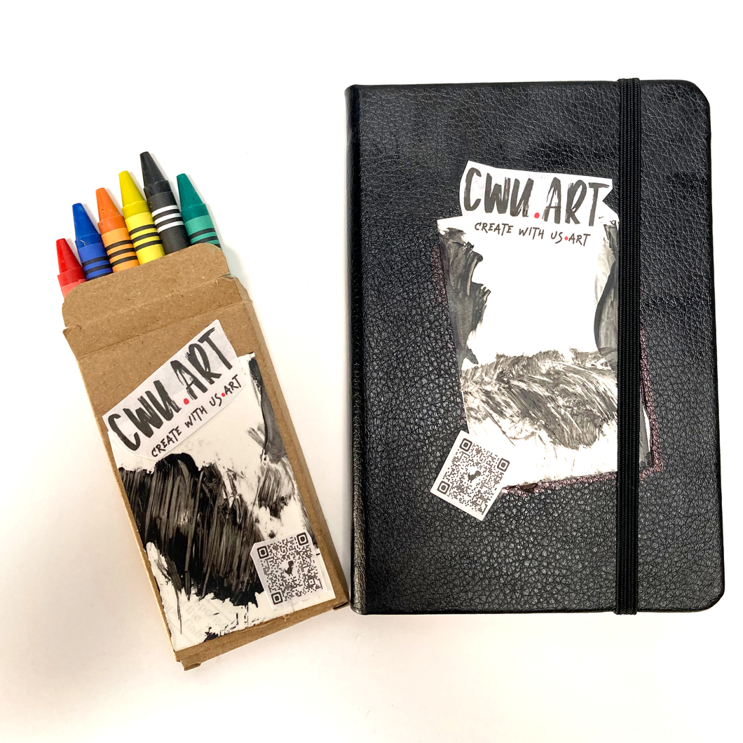 Black notebook and set of crayons with CWU ART branding on a white background. The Circulated Canvas: A Create-With-Us Chain Sketchbook