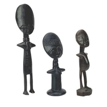 Load image into Gallery viewer, Three black figurines with detailed faces on a white background
