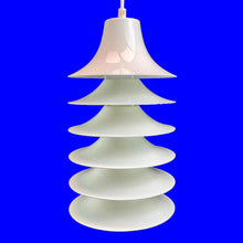 Load image into Gallery viewer, Stacked glass pendant lamp on a royal blue background
