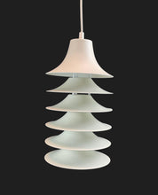 Load image into Gallery viewer, Pendant light with layered design on a black background
